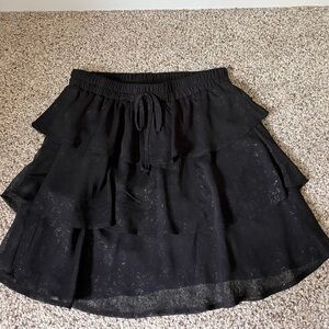 Black skirt with a light gold cheetah print pattern!